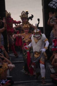 Traditional Kecak Dance performers in colorful costumes at Uluwatu Temple, a must-see cultural highlight on a Bali Trip