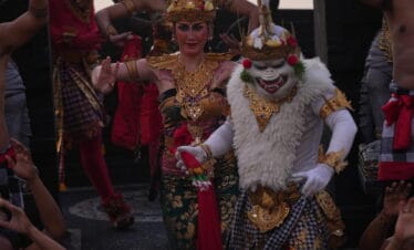 Traditional Kecak Dance performers in colorful costumes at Uluwatu Temple, a must-see cultural highlight on a Bali Trip