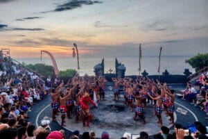 Kecak Dance performance at Uluwatu Temple during sunset, showcasing Balinese culture and tradition on a memorable Bali Trip.