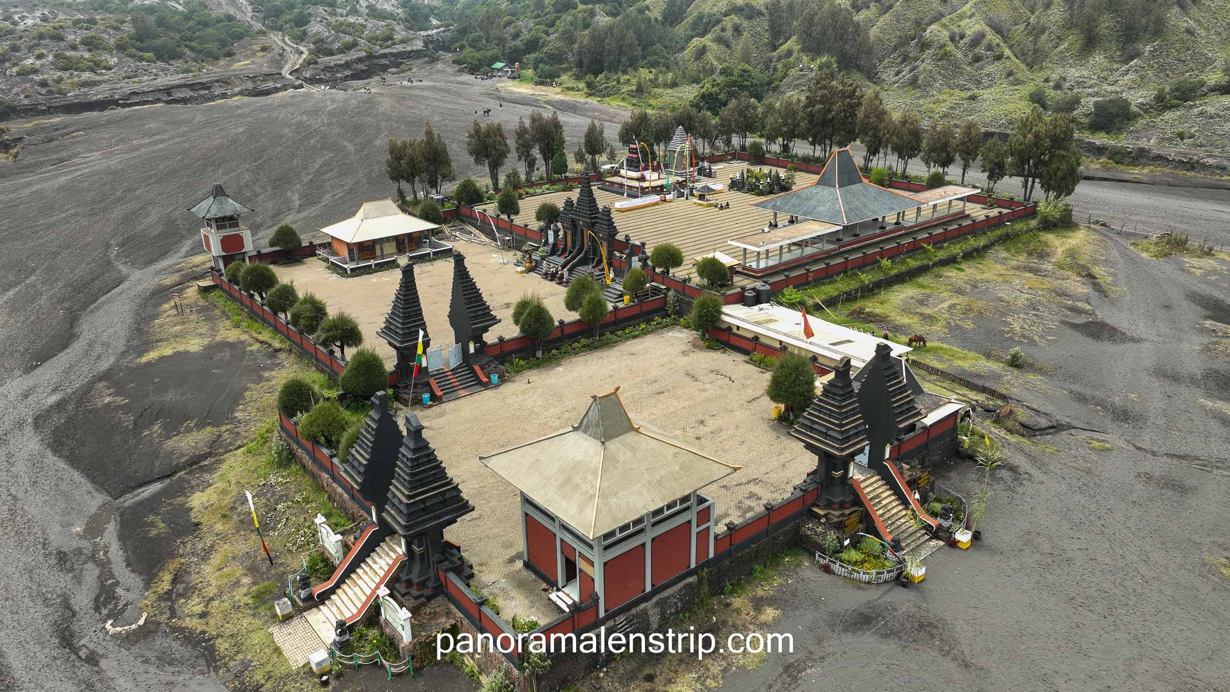 Aerial view of Pura Luhur Poten at Mount Bromo, showcasing sacred architecture and the unique Tengger culture and traditions surrounded by volcanic sand and mountain landscapes.