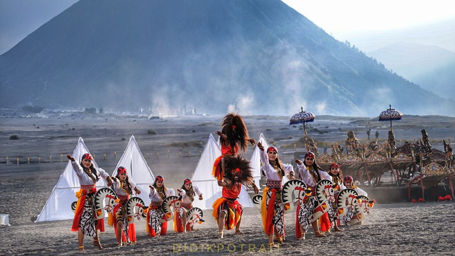 Traditional dancers performing during the Yadnya Kasada Bromo festival at Mount Bromo, East Java, Indonesia