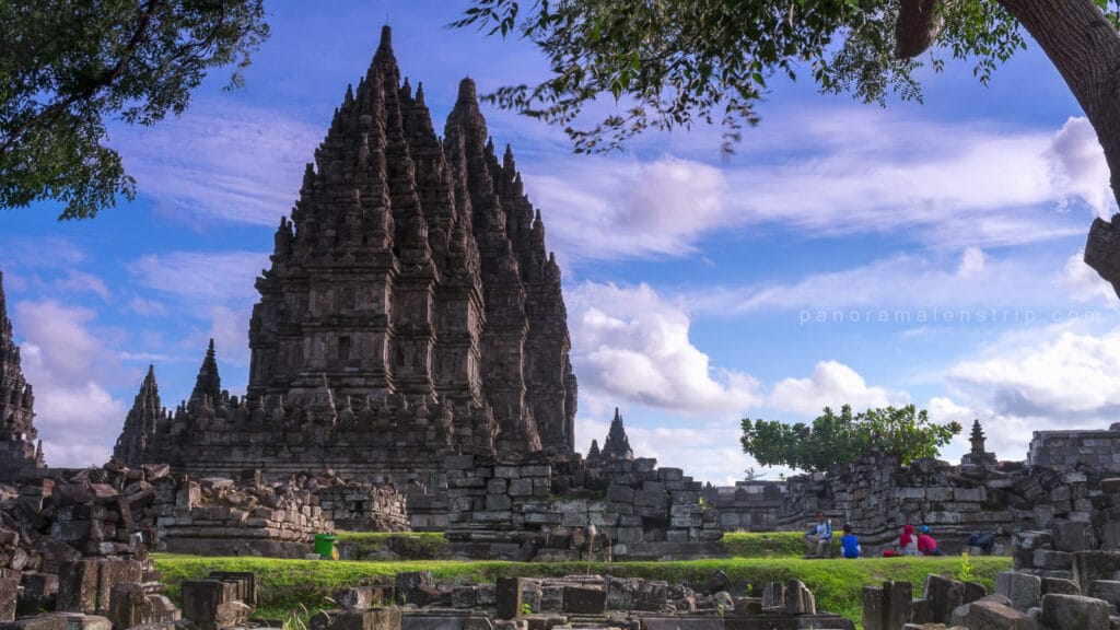 Prambanan Temple in Central Java under a blue sky, a must-visit landmark during a Trip to Yogyakarta.