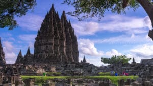 Prambanan Temple in Central Java under a blue sky, a must-visit landmark during a Trip to Yogyakarta.