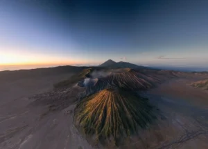 Aerial panoramic view of Mount Bromo and Tengger Caldera showcasing the 4 exclusive trekking zones