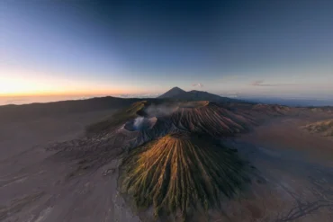 Aerial panoramic view of Mount Bromo and Tengger Caldera showcasing the 4 exclusive trekking zones