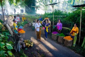 Women in kebaya selling fresh flowers at a Bali traditional village morning market.