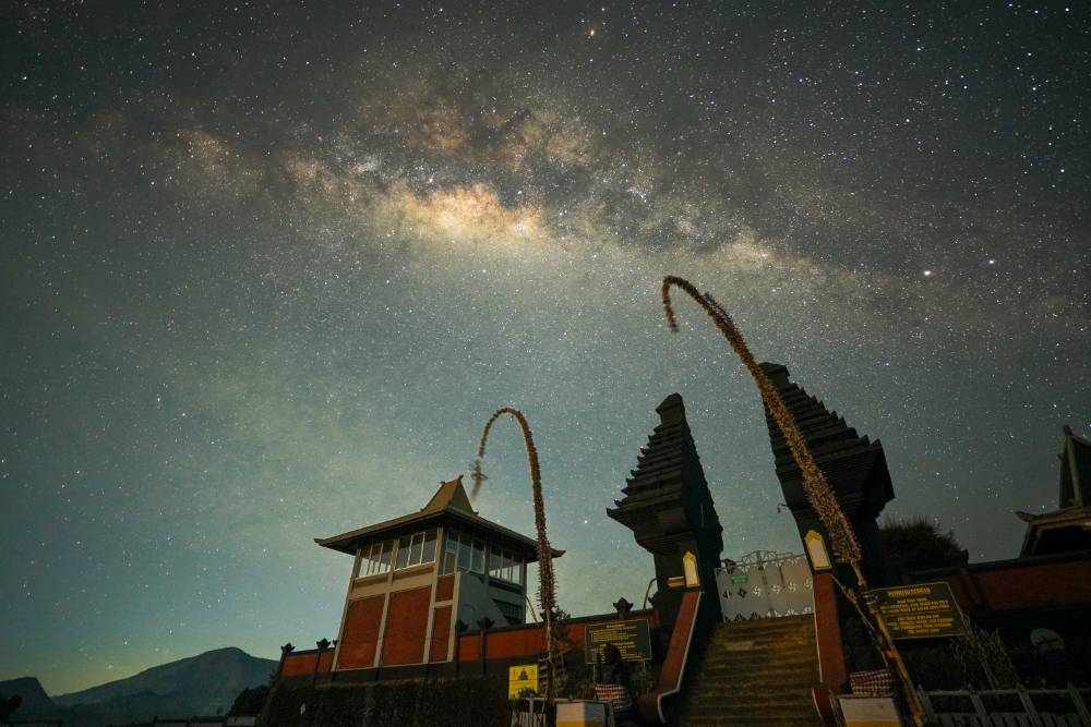 Pura Luhur Poten Bromo temple under the Milky Way at night