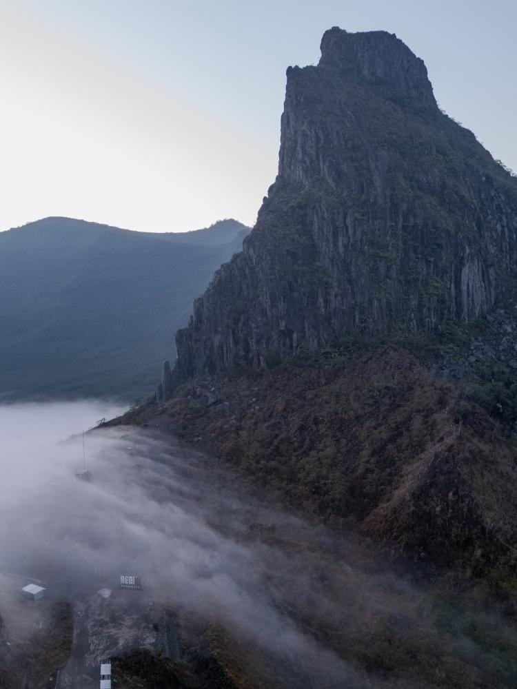 Morning fog flowing through the valley at Mount Kelud before 8 a.m.