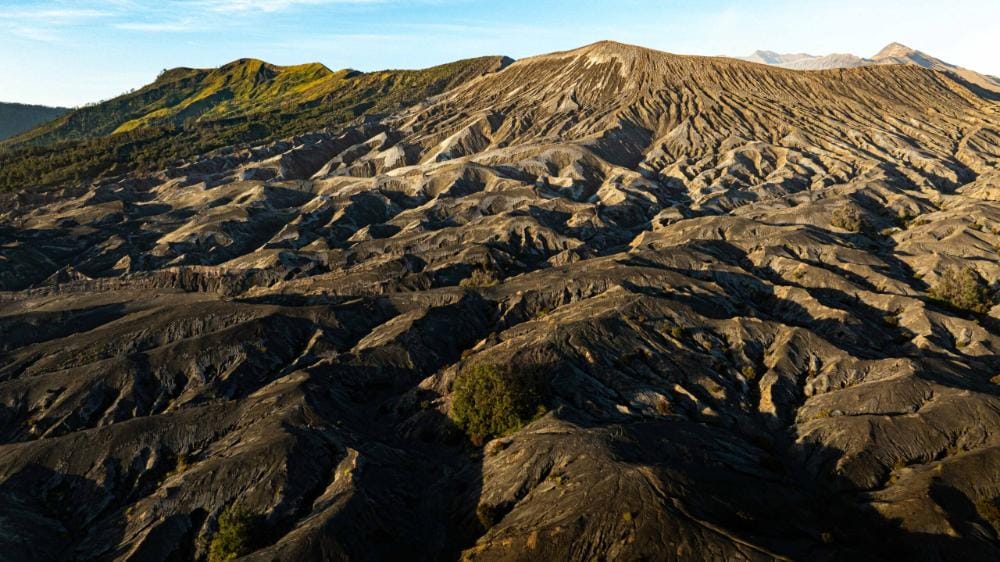 Misty volcanic landscape at Planet Bromo with an otherworldly, mystical atmosphere